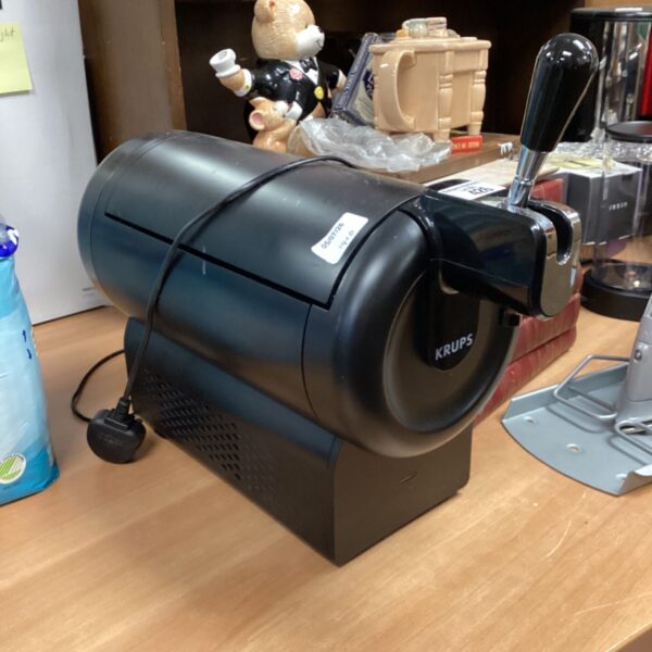 Black Krups beer dispenser for home use.