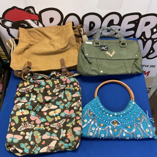 Ladies handbags lot including floral canvas satchel and beaded clutch.