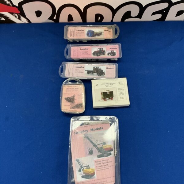 Boxed Langley Models sets of vintage farm toys and collectibles.
