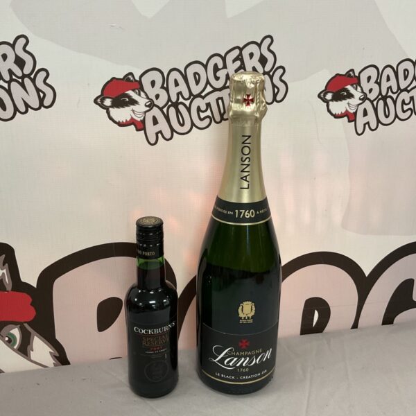 Lanson champagne and Cockburns port bottles for auction.
