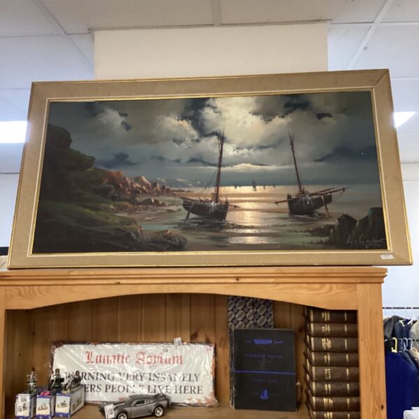 Large Le Gozil nautical painting of beached fishing boats and sailboats.