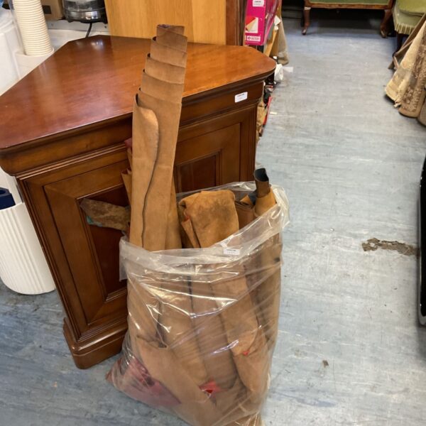 Large lot of leather and faux leather hides for crafting projects.
