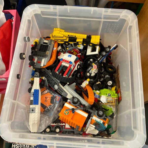 Large Lego bulk lot in a clear storage box.