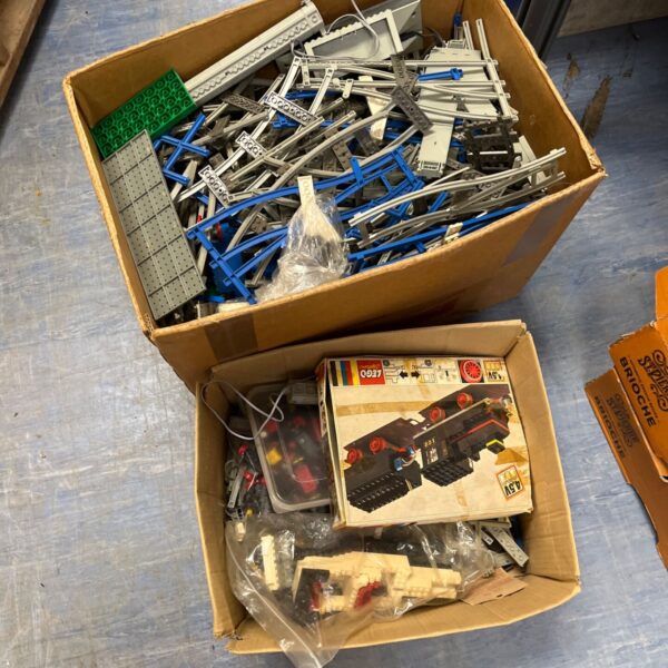 Large lot of vintage Lego train kit components and tracks.