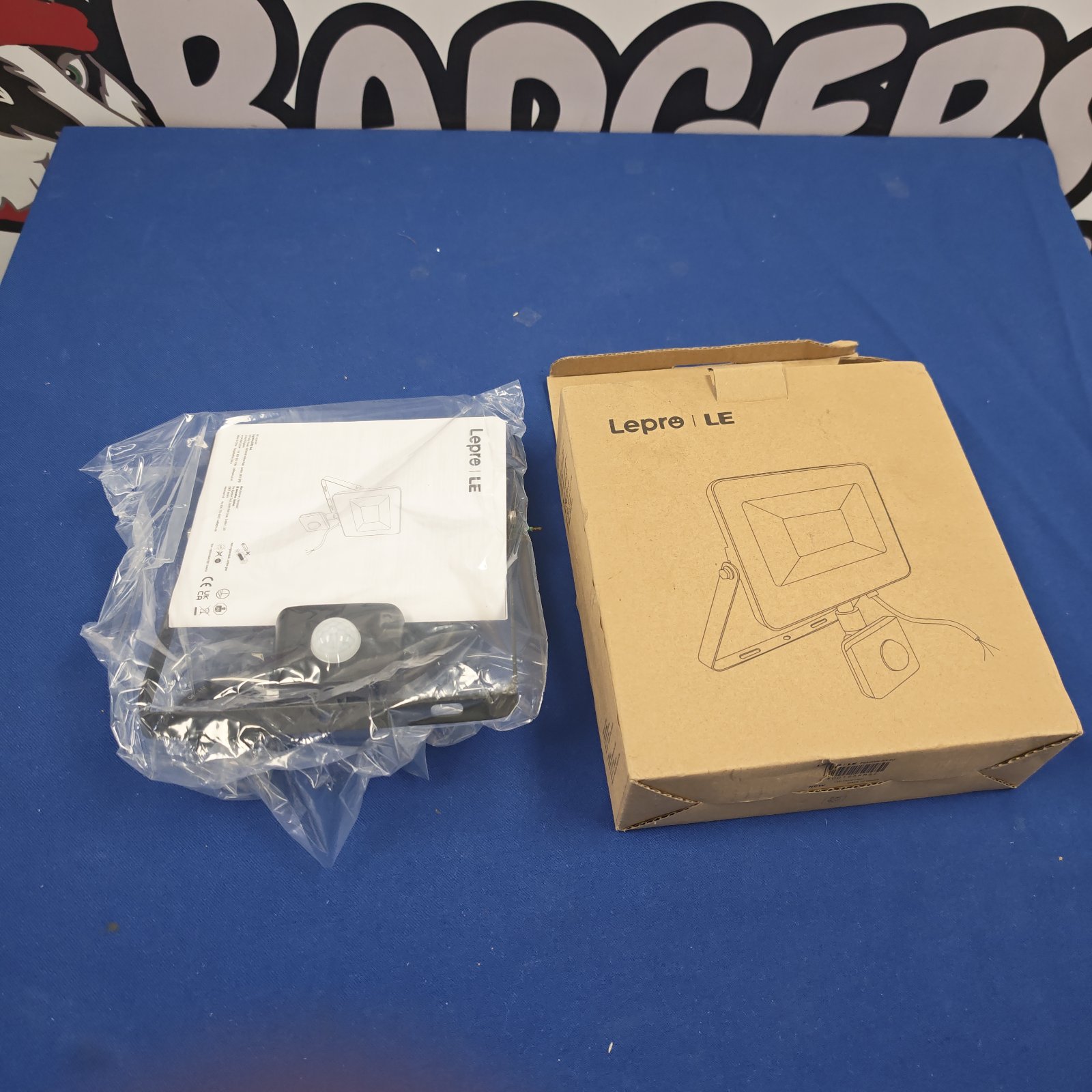 Lepro LE outdoor light in original packaging, as-found condition.