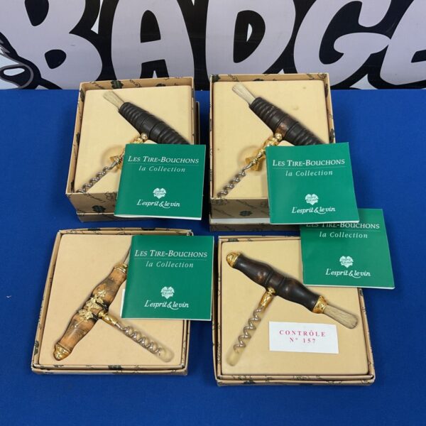 Vintage Les Tire-Bouchons corkscrew set with wood and brass.