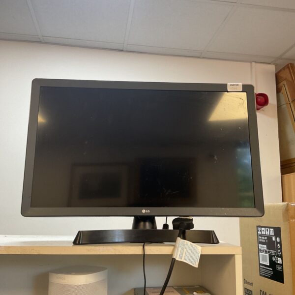 Black LG monitor on a desk, ideal for computer use.