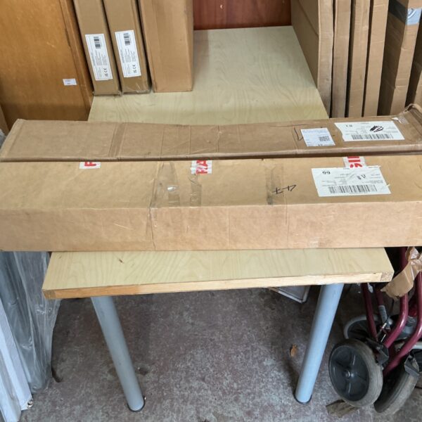 Two linear drains in original packaging, ready for bathroom installation.