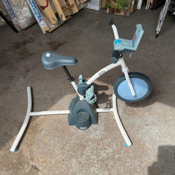 Little Tikes exercise bike for toddlers, featuring adjustable seat.