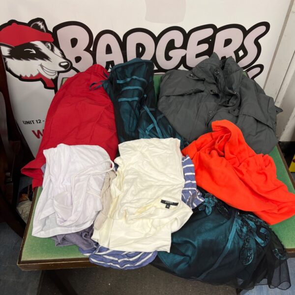 Bag of mixed clothes including dress and jacket