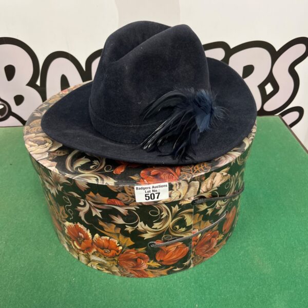 black Vivien Sheriff fedora features premium wool felt and a distinctive ostrich feather trim