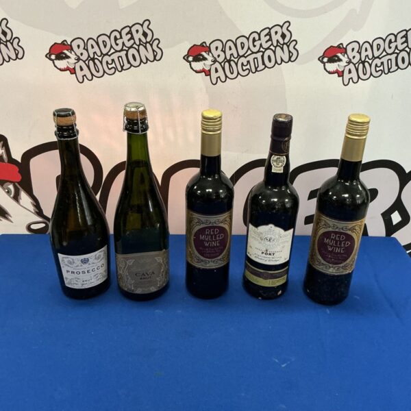 5 bottles of alcohol: Prosecco, Cava, Port, and two Red Mulled Wine