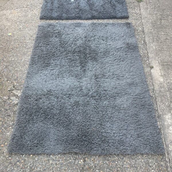 Pair of grey shaggy pile style rugs