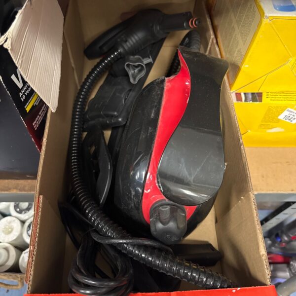Portable steam cleaning machine