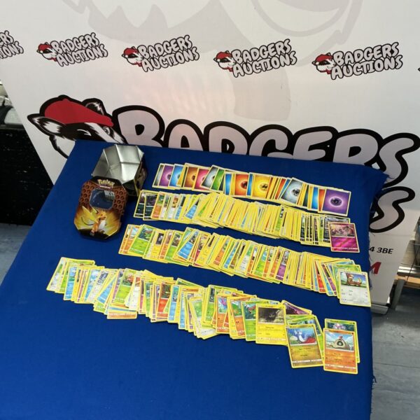Large Collection of Pokémon Trading Cards in Collectors Tin