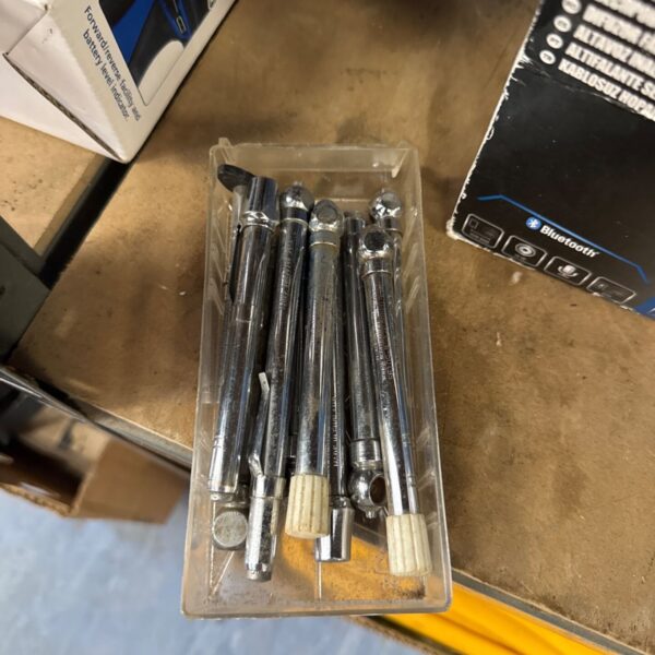 Small tray of tyre pressure gauges