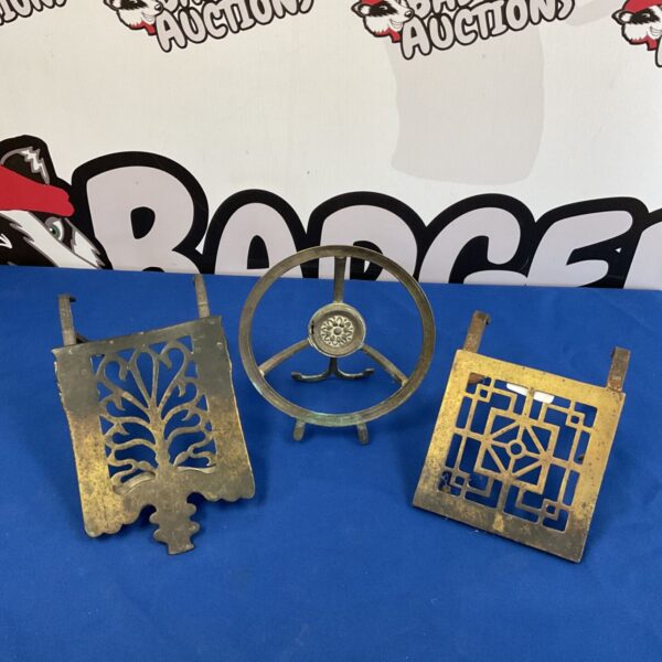 Three antique brass & iron fireplace trivets
