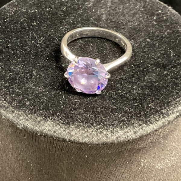 925 Silver Solitare style ring with amethyst colour stone Size R