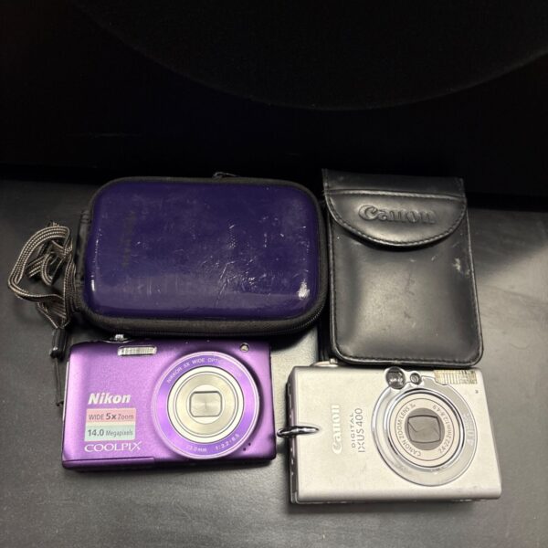 Nikon coolpix s3100 with canon ixus 400 in cases