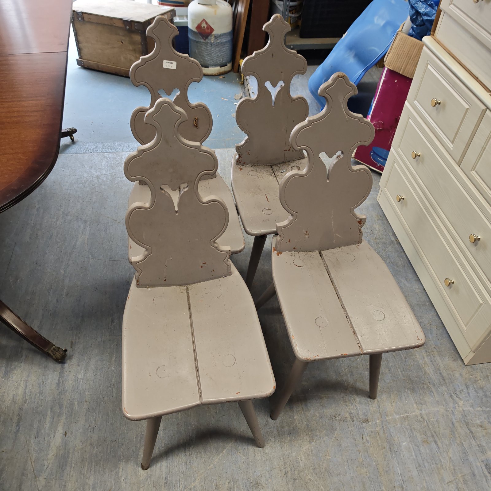 Four Scandinavian pine chairs