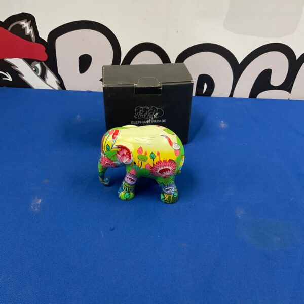 Colourful Lotus Elephant Parade figure with original box.