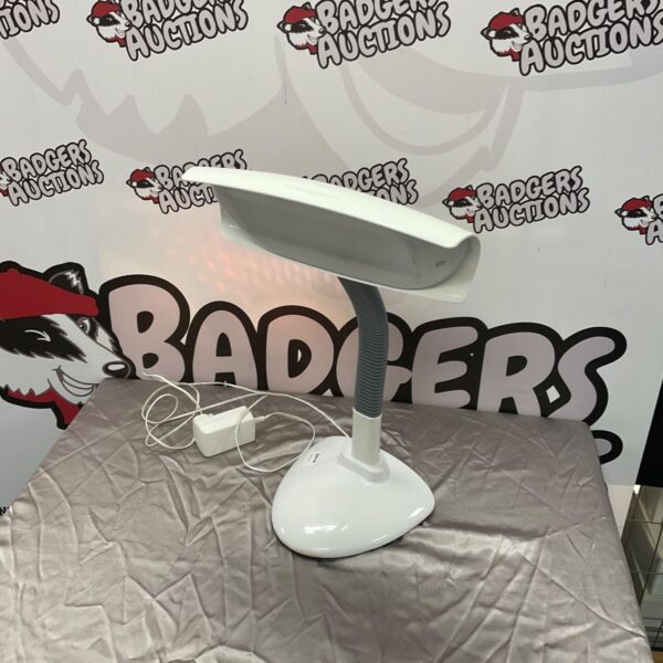 Side view of a Lumie reading lamp with a flexible neck.