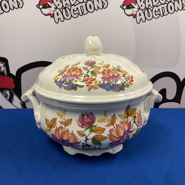 Vintage Luneville casserole dish with floral pattern.