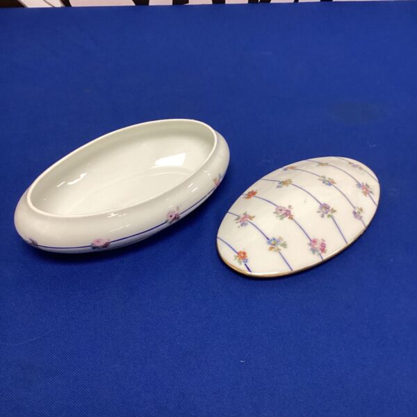 Vintage Luneville casserole dish with floral decoration.