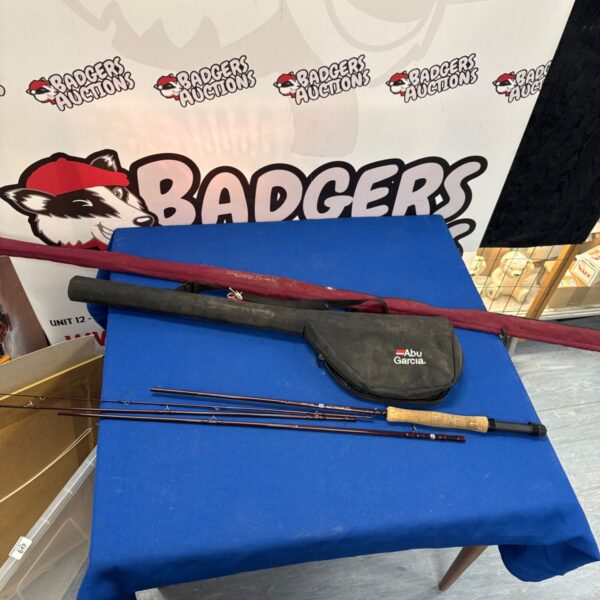 Vintage fly fishing rods, including a Mac Martin and Abu Garcia Diamond.