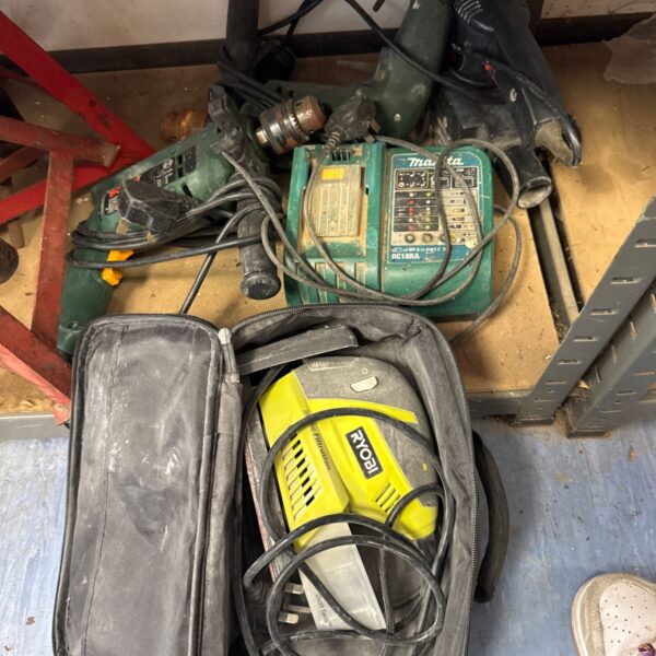 Makita DC18RA cordless drill in a black carrying case.