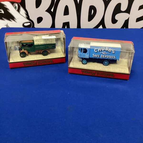 Vintage Matchbox Models of Yesteryear diecast trucks, detailed collectible toys.