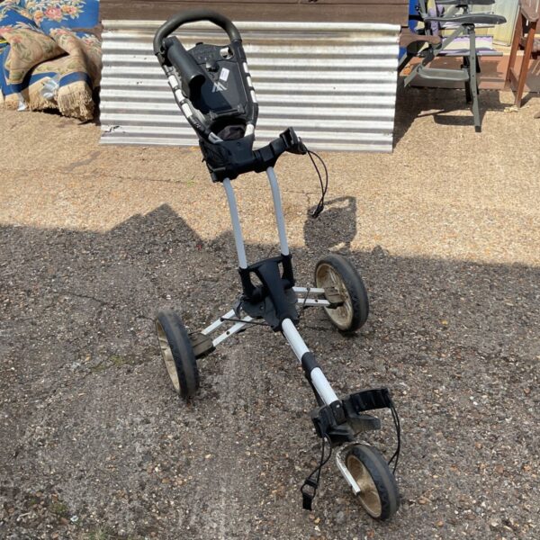MAX folding golf trolley in used condition, ideal for golf course transport.