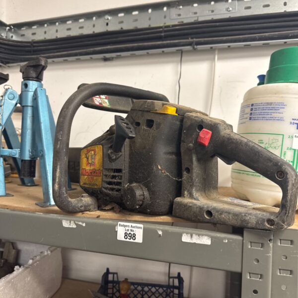 Vintage McCulloch Maccat 839 petrol chainsaw for garden and forestry work.