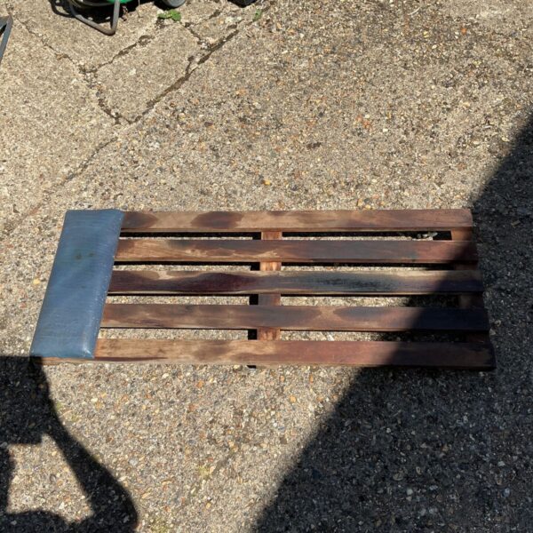 Solid wood mechanics crawler board for garage work.