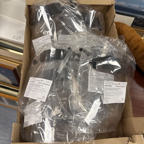 Tray of Medi Visor masks, protective face shields in original packaging.