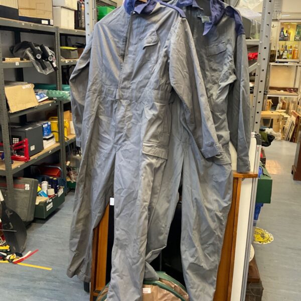 Grey-blue men's workwear overalls, vintage industrial clothing.