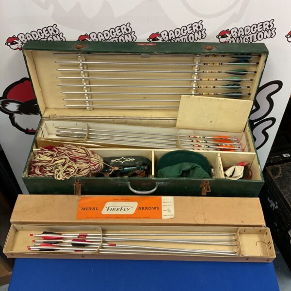 Vintage metal Firefly arrows in a carrying case, archery collectible.