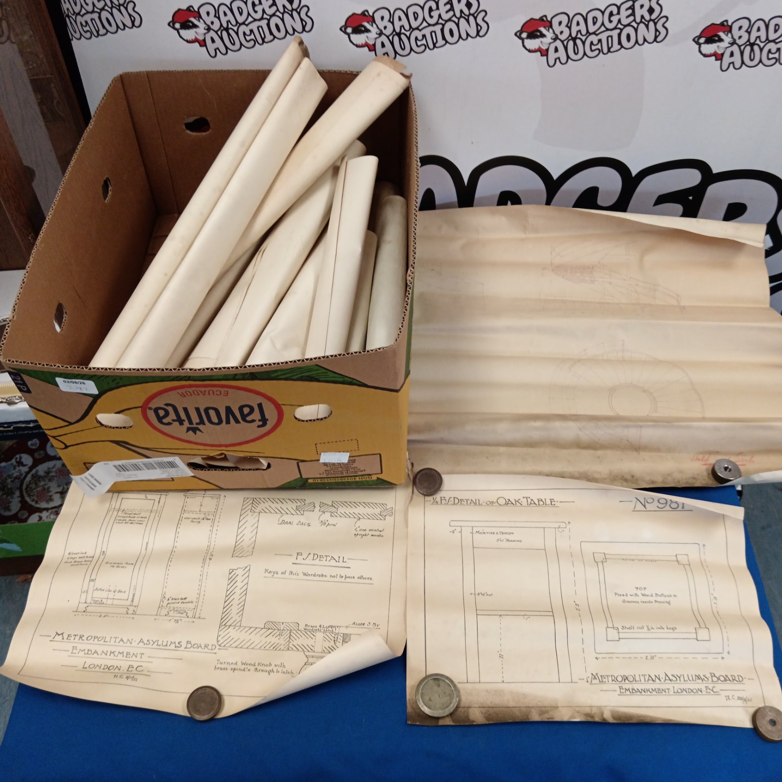 Vintage Metropolitan Asylums Board architectural plans and wooden components.
