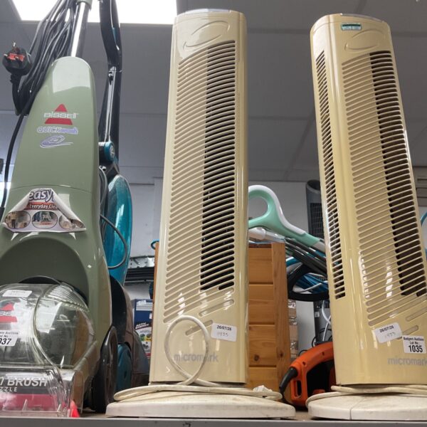 Beige Micromark tower fan for auction, vintage cooling appliance.