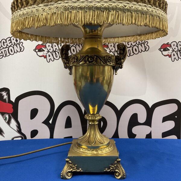 Vintage mid-century brass table lamp with pleated shade.