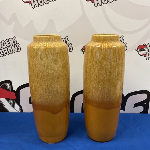 Pair of mid-century fat lava vases with textured glaze.
