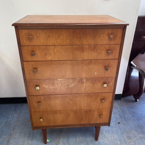 Vintage mid-century modern chest of drawers with square pulls.