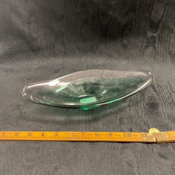 Vibrant green mid-century Murano glass bowl with swirling details.