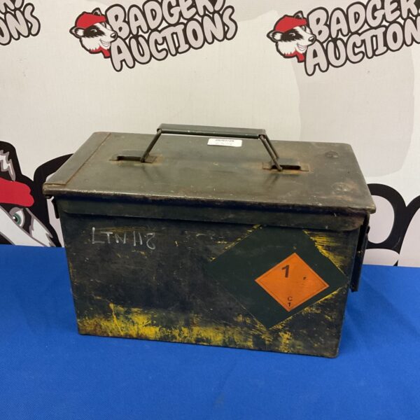 Vintage military ammo tin with latch and handle.