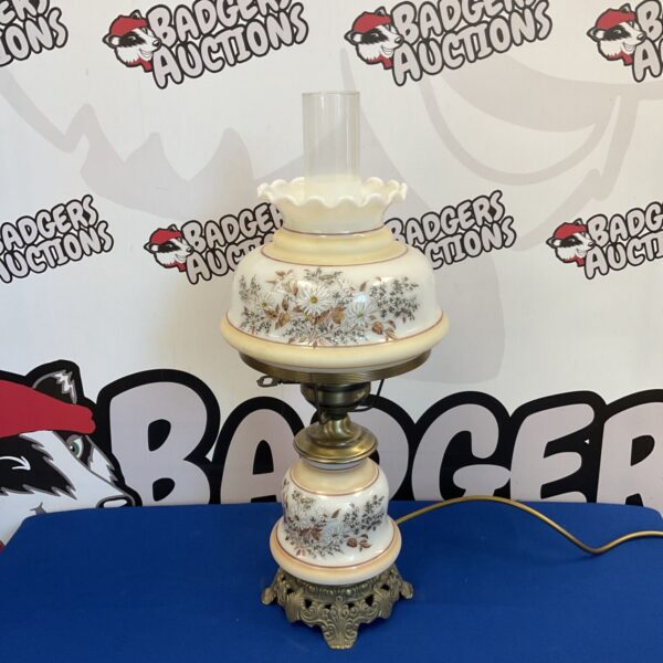Vintage milk glass table lamp with floral shade.