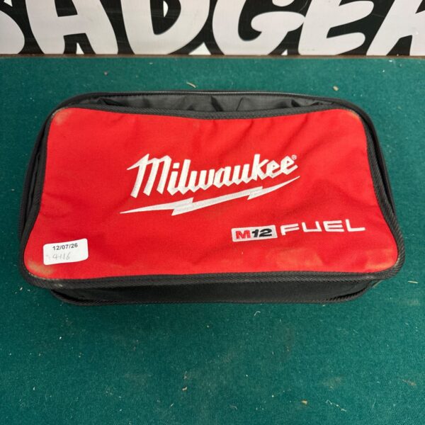 Empty Milwaukee M12 Fuel charger case for tool storage.