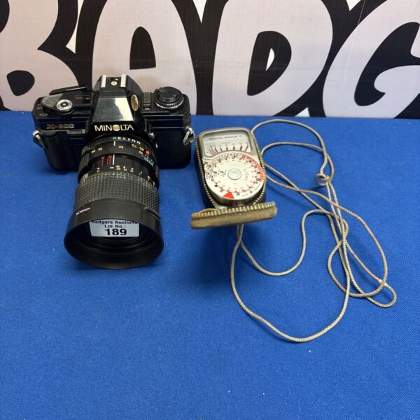 Vintage Minolta X-300 camera with Weston Master V light meter.