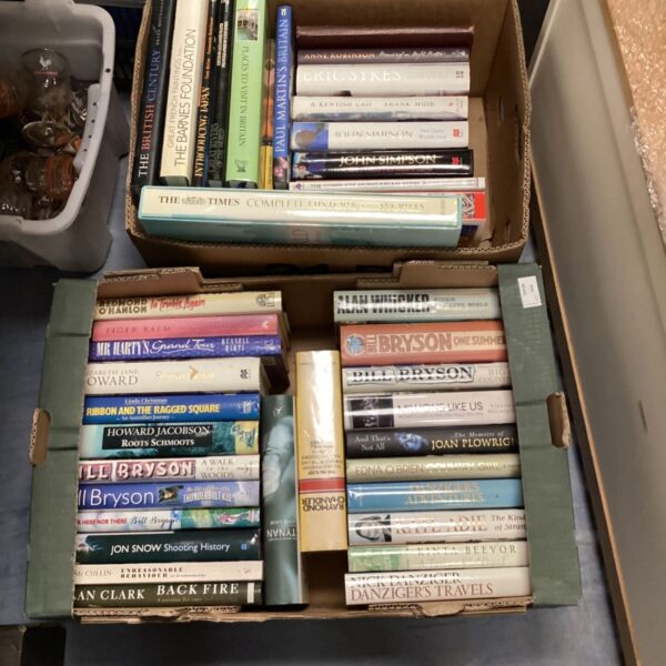 Mixed book lot including books by John Simpson and Bill Bryson.