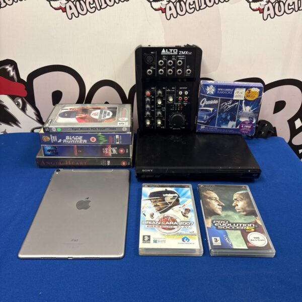 Mixed electricals lot featuring Alto ZMX52 mixer, Apple iPad, and video games.