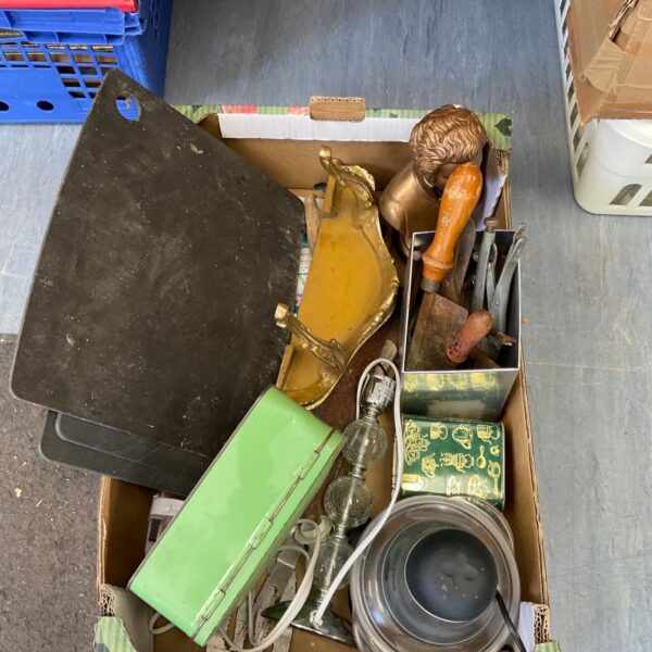 Mixed lot of vintage tools and brass collectibles in a box.
